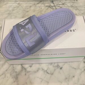 APL Women’s Techloom Satin Slide in color Bellflower